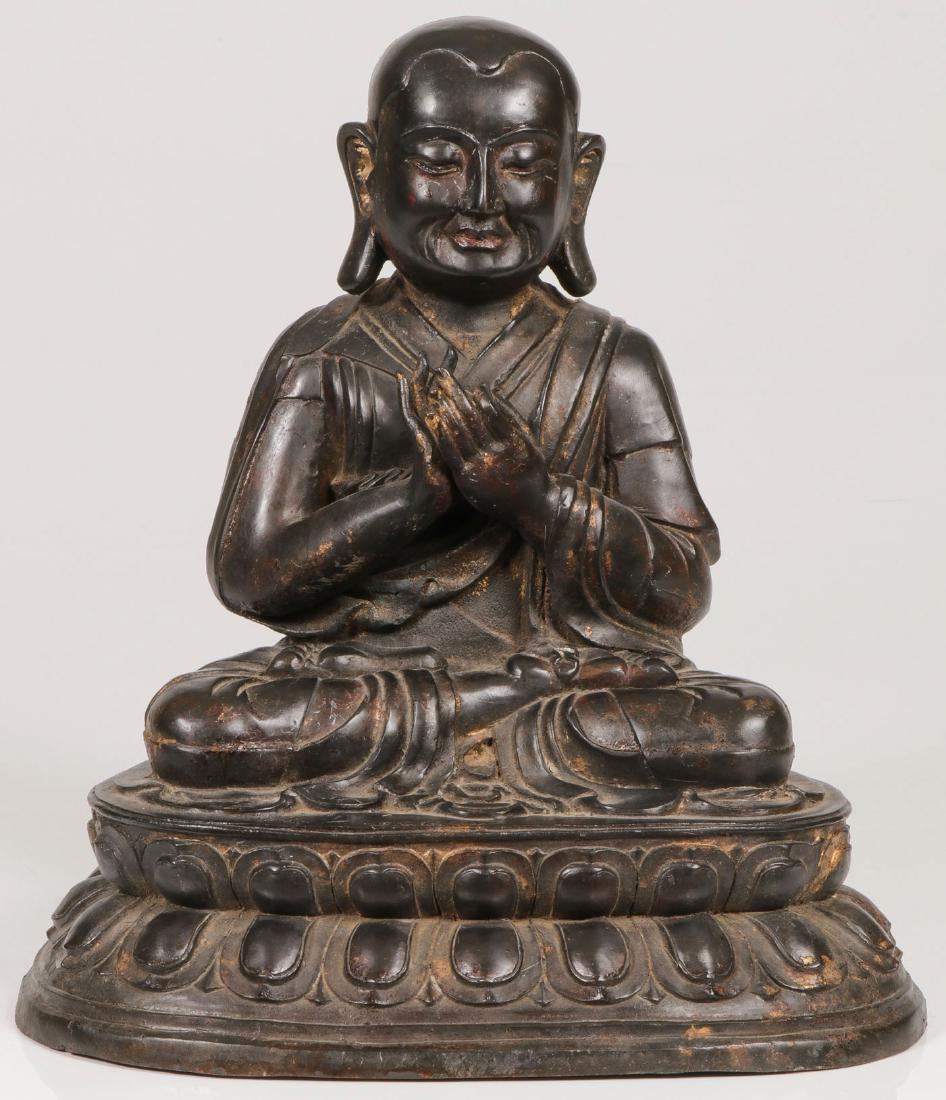 A LARGE AND IMPRESSIVE CHINESE BRONZE BUDDHA: A LARGE AND IMPRESSIVE CHINESE BRONZE BUDDHA. Finely sculpted of good proportions and detail with deep folds, the Buddha resting on a double lotus base and with traces of gilding. Height 15 inches (38