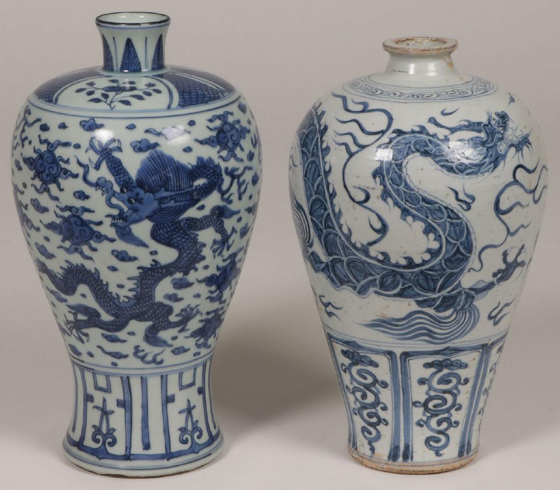 PAIR CHINESE BLUE & WHITE MEIPING DRAGON VASES: A PAIR OF CHINESE BLUE AND WHITE MEIPING DRAGON VASES. The bodies overall decorated with dragons, clouds, and other Buddhist symbolism. Greatest height 12.75 inches (32 cm) SHIPPING NOTICE: Jackson