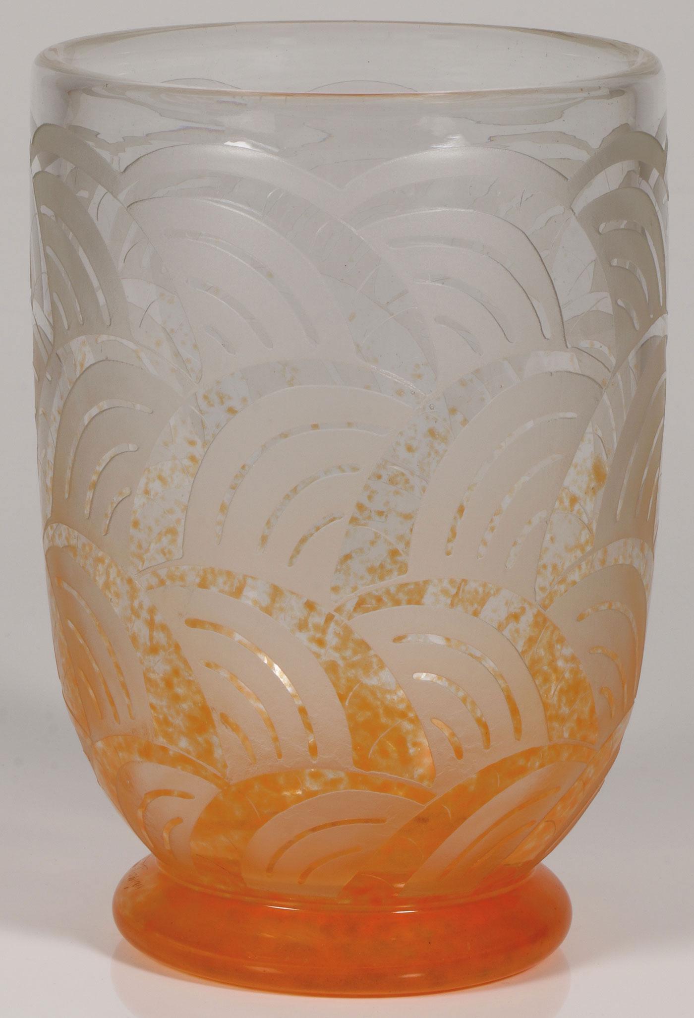 A SCHNEIDER LE VERRE FRANCAIS CAMEO VASE, C. 1928: A SCHNEIDER LE VERRE FRANCAIS CAMEO VASE, CIRCA 1928. Resting on a slightly flared foot, the sides of the bucket form vase with cut wave or leaf forms. Signed on base CHARDER LE VERRE FRANCAIS, and on