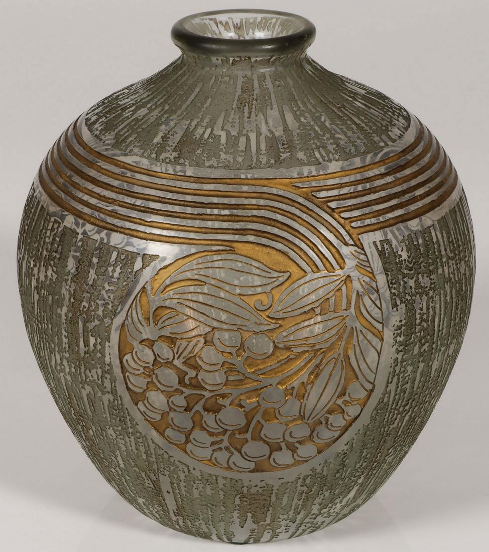 A DAUM ART DECO ACID-CUT VASE: A DAUM ART DECO ACID-CUT VASE. Of bulbous form, the sides with etched bark texture and linear carved rings terminating in leaved berry twigs with gilt highlighting. Underside of base marked Daum Nancy