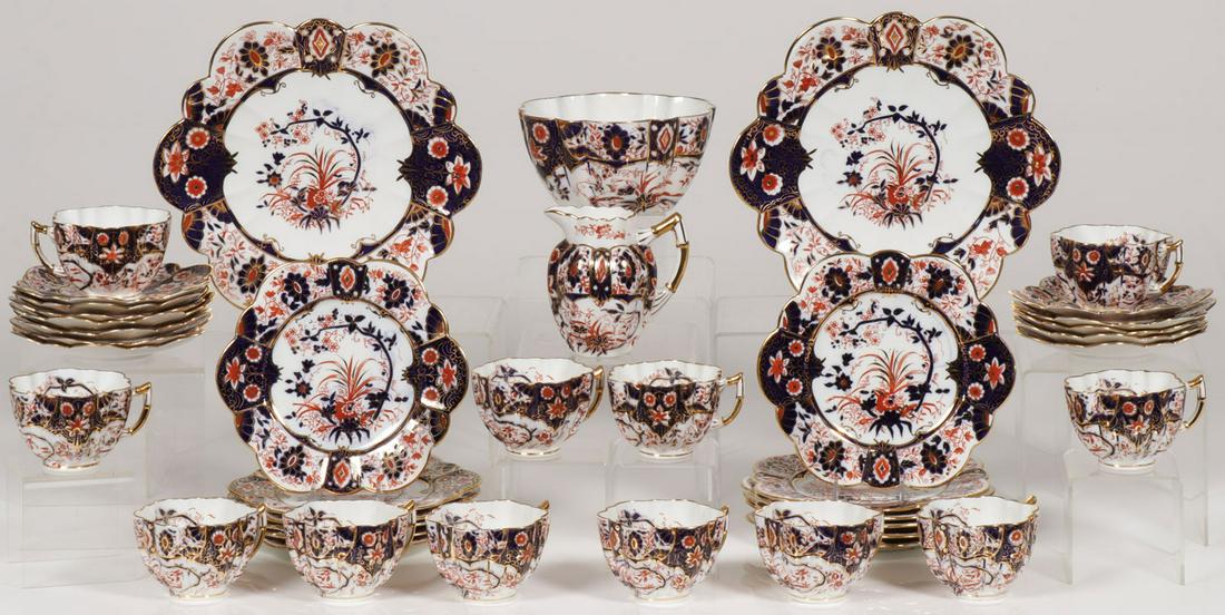 WILEMAN & SHELLEY IMARI ENGLISH PORCELAIN DESSERT: WILEMAN & SHELLEY IMARI ENGLISH PORCELAIN DESSERT. Comprising a circa 1889 partial dessert set by Wileman & Shelly in the Japan (or Imari) daisy pattern including 12 matching cups and saucers, 12 cake