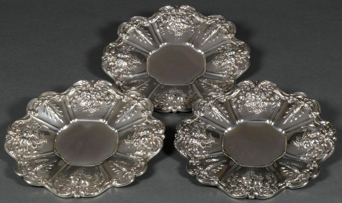 THREE FRANCIS I STERLING SANDWICH PLATES: THREE FRANCIS I STERLING SANDWICH PLATES. Comprising three matching Reed & Barton sterling silver sandwich plates in Francis I Pattern (X569). With sunken cavetto and the borders in high relief repou