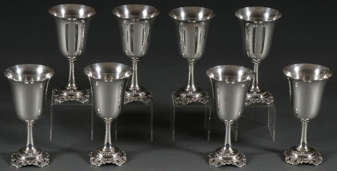 EIGHT WALLACE STERLING GRAND BAROQUE GOBLETS: EIGHT WALLACE STERLING GRAND BAROQUE GOBLETS. Comprising eight matching sterling goblets on raised pierced feet with pedestal stem and bell form cup in the Grand Baroque pattern, each marked Wallace, 