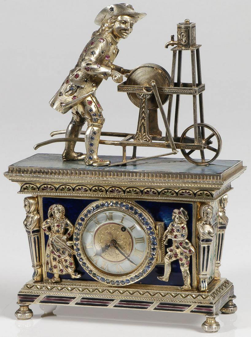 EXCEPTIONAL VIENNESE SILVER LAPIS & ENAMEL CLOCK: EXCEPTIONAL VIENNESE SILVER LAPIS & ENAMEL CLOCK, 19TH C. Comprising an exceptional silver-gilt, enamel, and gem-set lapis figural clock, Austrian circa 1880 in the manner of Hermann Ratzersdorfer (18