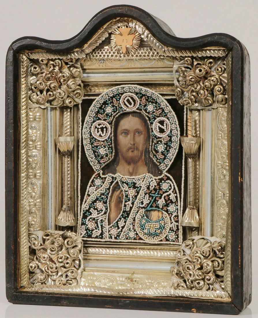 A RUSSIAN ICON OF CHRIST, 19TH CENTURY: A RUSSIAN ICON OF CHRIST, 19TH CENTURY. Contained in its original arched topped shadow box frame kiot. Here Christ delivers a blessing and holds an orb, being a symbol of his rule over the cosmos, th