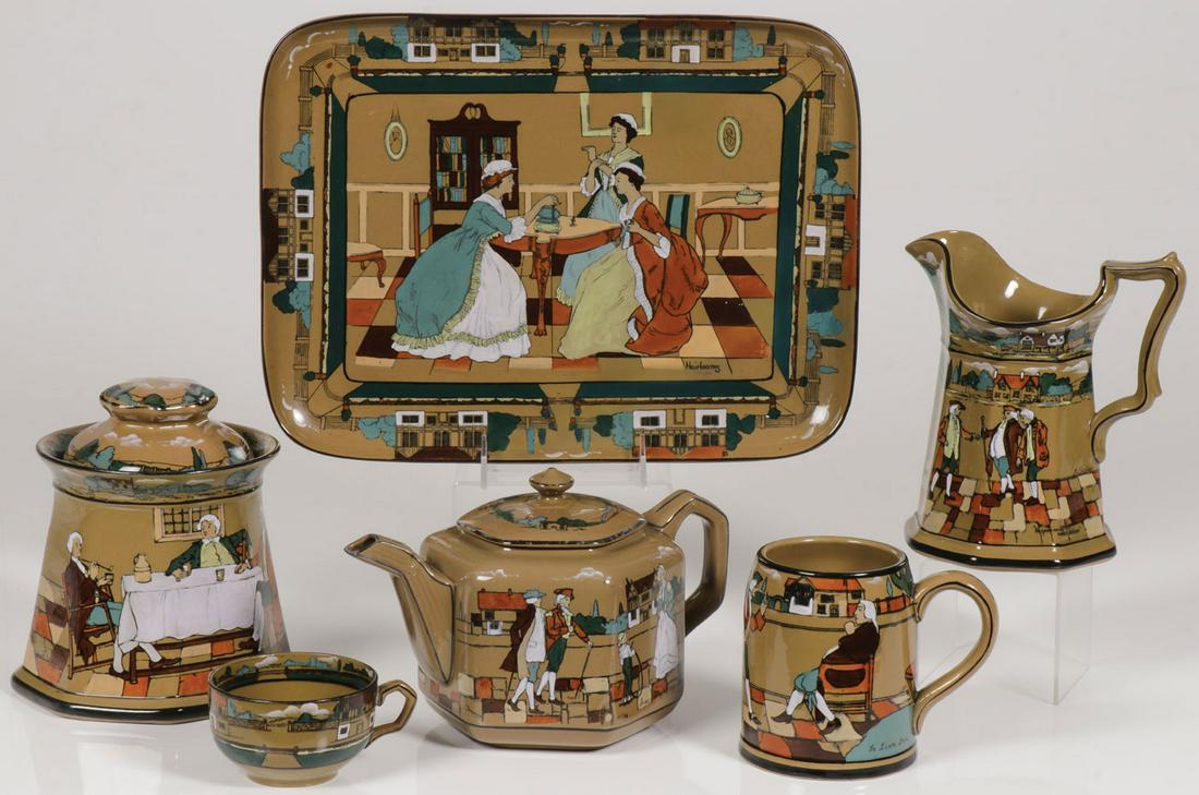 BUFFALO POTTERY DELDARE WARE: BUFFALO POTTERY DELDARE WARE. Comprising six various pieces including a serving tray, a teapot, a humidor, a teacup, a mug, and a pitcher. Greatest measurement (tray) 13.8 inches. SHIPPING NOTICE: