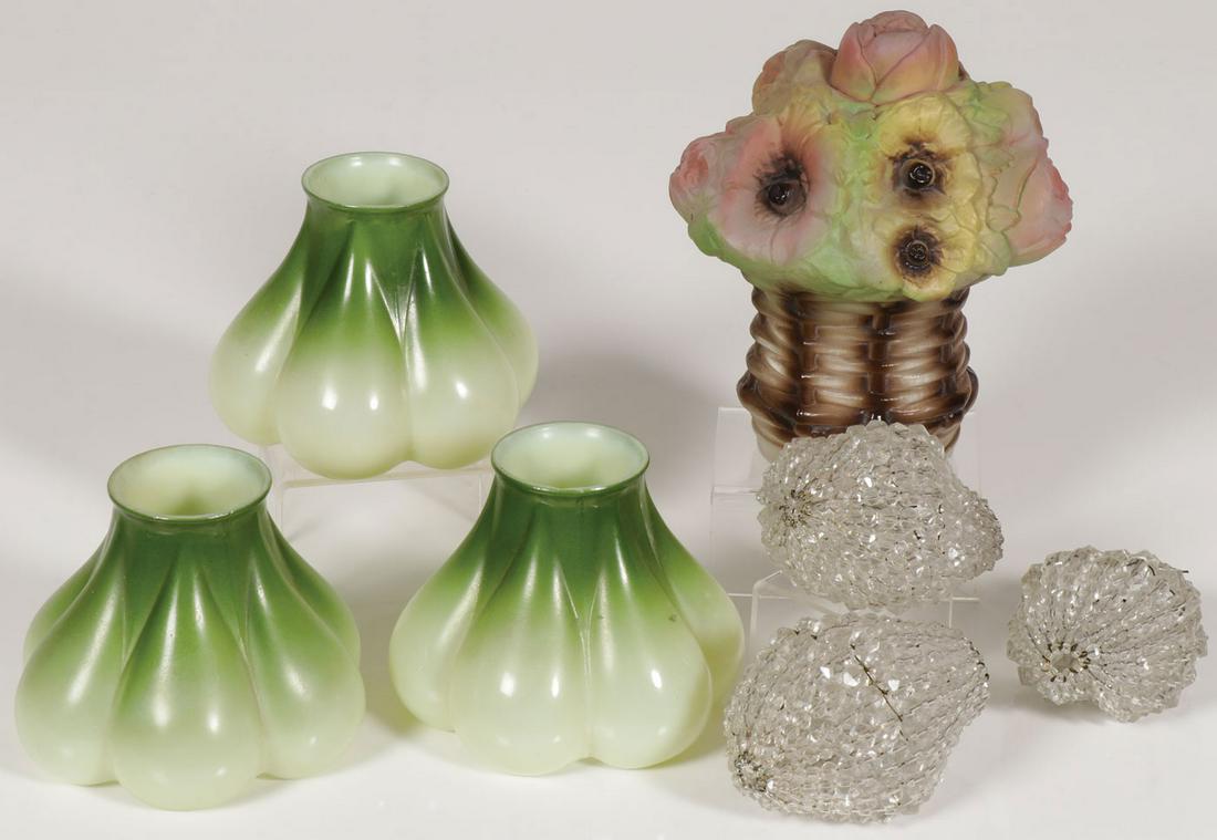 VINTAGE LIGHTING AND SHADE GROUP: VINTAGE LIGHTING AND SHADE GROUP. Comprising three opaque floral blossom shades, height 4 inches, the fitter 2.25 inches, a reverse painted screw-on flower basket shade, height 7 inches, diameter of s