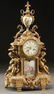 305: A MANTLE CLOCK, FRENCH LOUIS XVI STYLE GILT BRONZE