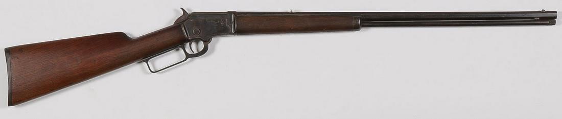 A MARLIN M 92 LEVER ACTION RIFLE: A MARLIN M 92 LEVER ACTION RIFLE. Comprising a Marlin Model 1892 lever action rifle in .22 caliber rimfire with 24-inch octagon barrel, full length magazine, takedown design. Serial number 308198. SHI