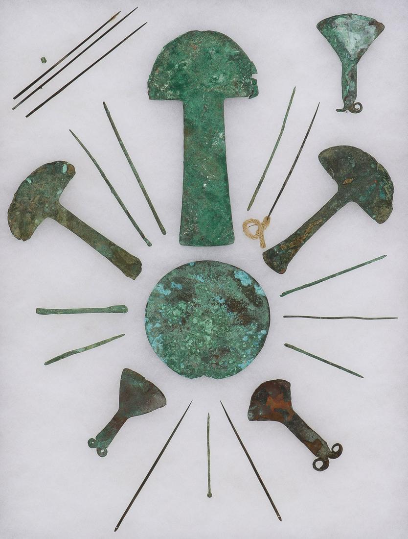 PRE-COLUMBIAN BRONZE COLLECTION: PRE-COLUMBIAN BRONZE COLLECTION. Comprising over 20 individual pre-Columbian bronze pieces, including various tumi, needles, and pendants, most with naturally occurring patina covered surface. Greates