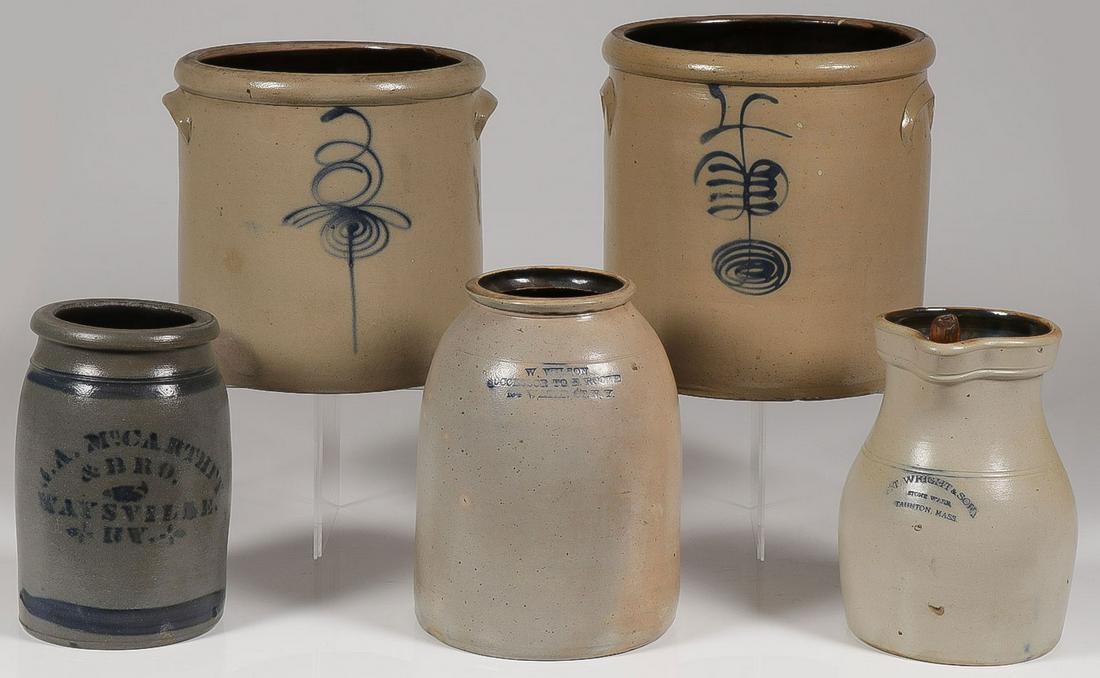 FIVE COBALT DECORATED CROCKS: FIVE COBALT DECORATED CROCKS. Comprising a three-gallon and four-gallon crock, a J.A. Mcarthey & Bro. Maysville, KY crock, lower left, a W. Wilson crock, impressed "Successor to E. Roome, 134 Water St