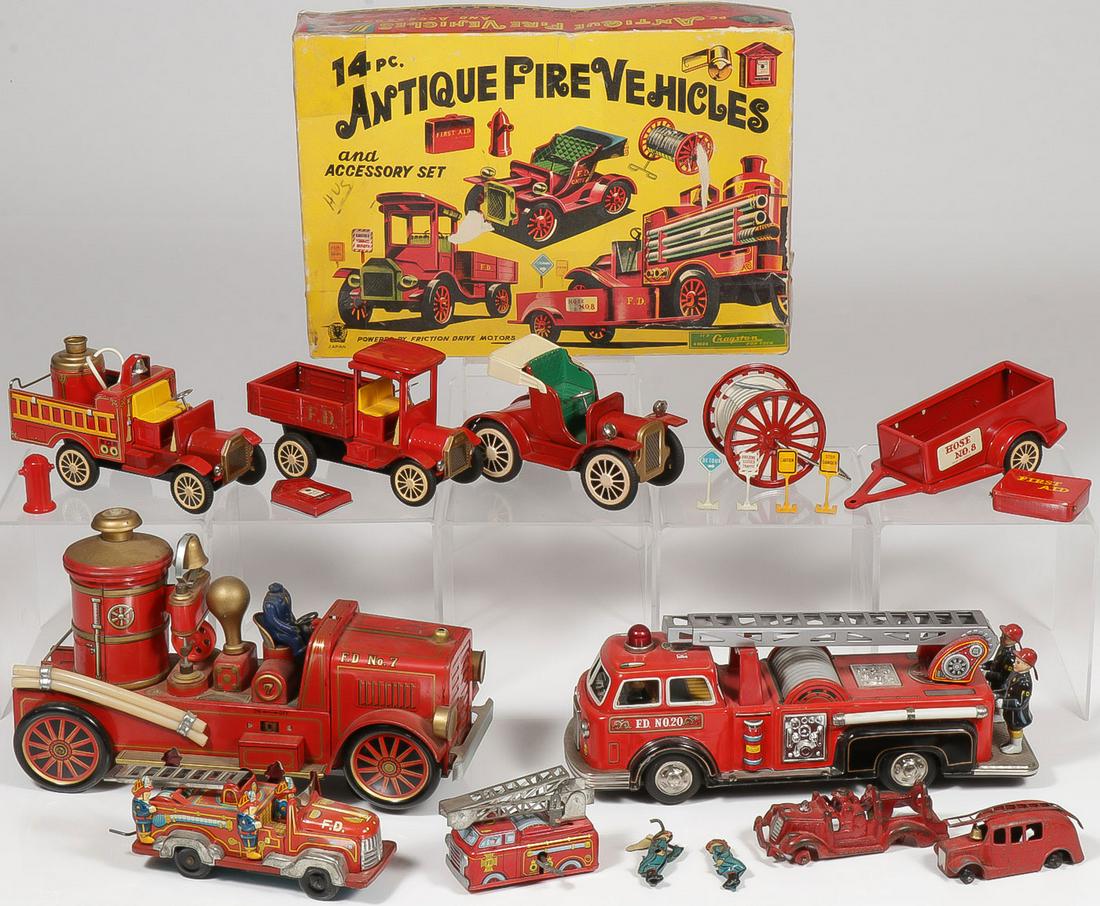 VINTAGE TOY FIRE ENGINES: VINTAGE TOY FIRE ENGINES. Comprising a boxed Cragstan 14 piece Antique Fire Vehicle set with original box, appears complete, a tin battery-operated ladder truck, length 12.25 inches, a Japanese tin b