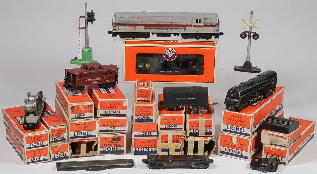 A LARGE MIXED LIONEL TRAINS LOT: A LARGE MIXED LIONEL TRAINS LOT. Comprising three locomotives (624, 671 & 204) all in original box, a 2321 Lackawanna Diesel, no box, a 6417 Caboose, a 6520 Searchlight Car, a 6468 Baltimore & Ohio A