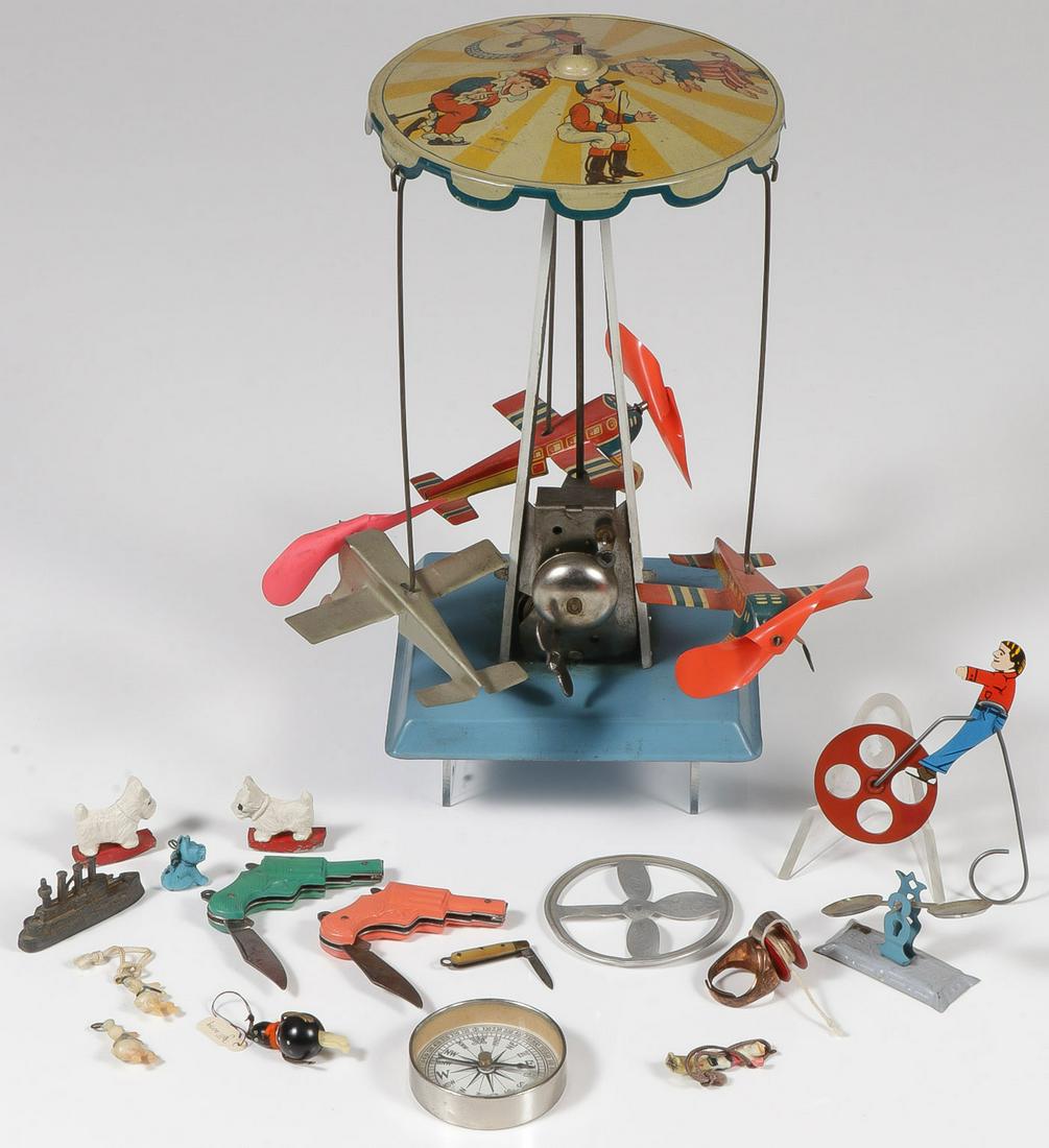 GERMAN U.S. ZONE WIND-UP & PENNY TOYS: GERMAN U.S. ZONE WIND-UP & PENNY TOYS. Comprising a nice large tin wind-up airplane roundabout marked "Germany USA Zone", bell rings, planes fly. Additionally a tin penny toy scale, flying saucer rin