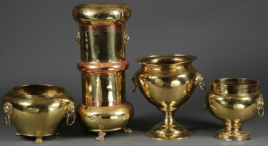 RUSSIAN ARTS & CRAFTS WARES: RUSSIAN ARTS & CRAFTS WARES. Comprising four large and attractive brass and copper objects including a footed umbrella stand, and three flower pots, the underside of each with various maker's marks an