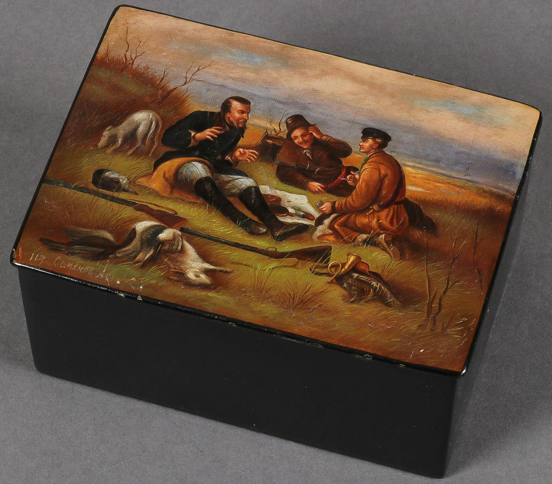 VINTAGE RUSSIAN TEA BOX: VINTAGE RUSSIAN TEA BOX. Comprising a lacquerware box, the hinged lid painted with a scene of hunters and the interior in red lacquer. Width 4.75 inches (12 cm). SHIPPING NOTICE: Jackson's is you