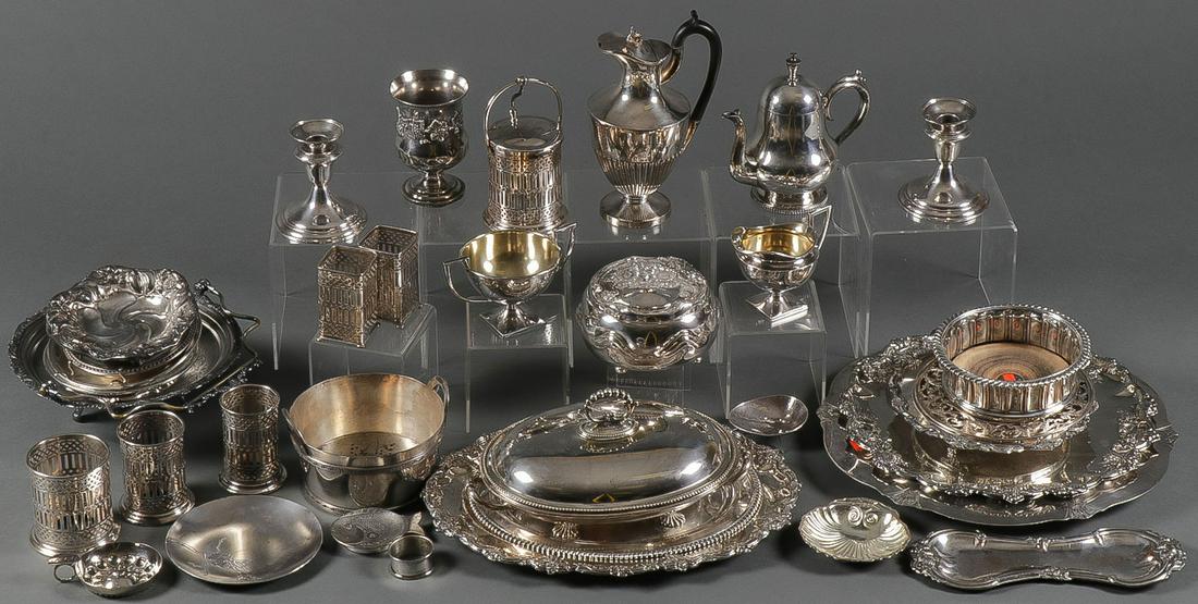 LARGE MIXED SILVER PLATE GROUP: LARGE MIXED SILVER PLATE GROUP. Comprising over 35 individual items representing a variety of silver plated table wares, dresser wares, and the like, covering the period from 1875 - 1930, including ch