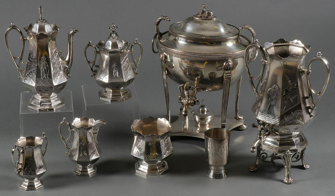 VICTORIAN SILVER PLATE: VICTORIAN SILVER PLATE. Comprising an impressive six-piece Simpson, Hall, Miller, & Co, silver-plated coffee and tea service in the Oriental taste (urn without lid), together with an ornate silver-pla