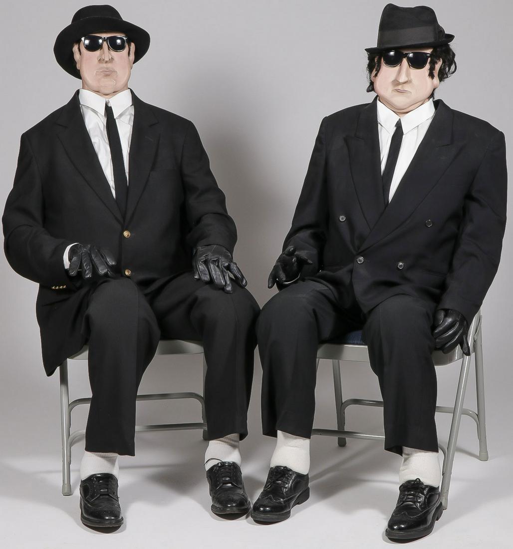 BLUES BROTHERS SOFT SCULPTURE GROUP: BLUES BROTHERS SOFT SCULPTURE GROUP. Comprising two whimsical individual soft sculpted figures of Elwood and Jake - The Blues Brothers. Lifesize and together with a Blues Brother concert poster. SHIPP