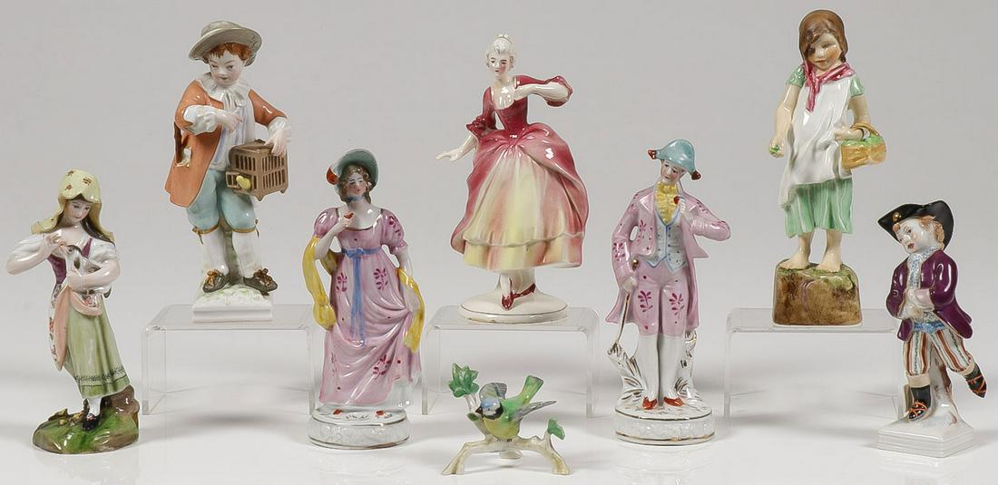 EUROPEAN FIGURAL PORCELAIN GROUPING C 1890-1920: EUROPEAN FIGURAL PORCELAIN GROUPING, C 1890-1920. Comprising eight individual porcelain decorated figurines including a KPM marked running boy in tricorn hat, and bird seller, as well as a Royal Worc