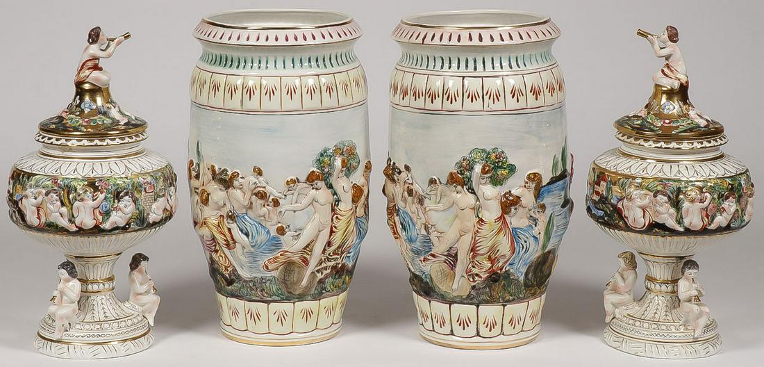 LARGE CAPODIMONTE GROUP: LARGE CAPODIMONTE GROUP. Comprising a pair of large matching barrel form urns with raised classical decoration, height 18.75 inches, and a pair of matching lidded urns, also with raised decoration, g