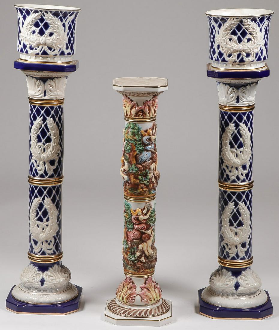 GLAZED PEDESTALS AND URNS: GLAZED PEDESTALS AND URNS. Comprising a matching pair of blue and gilt-decorated pedestals with matching urns, both marked "Made in Italy." Together with an ornate Capodimonte style pedestal, greates
