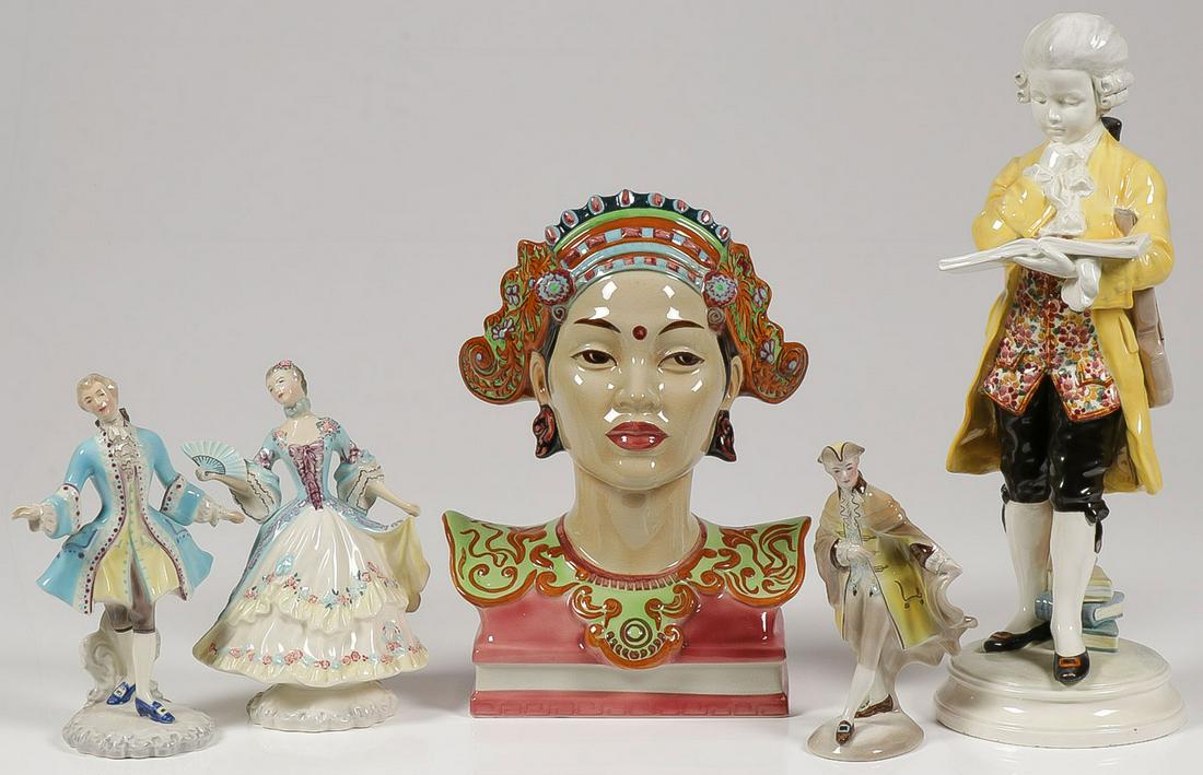 GOLDSCHEIDER AND OTHER FIGURES: GOLDSCHEIDER AND OTHER FIGURES. Comprising three Goldscheider figures including the young "Mozart" (tip of violin missing), a bust of an Asian female, the "Prince of Wales," and a matching pair of Gol