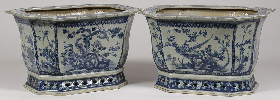 PAIR CHINESE BLUE AND WHITE PLANTERS: PAIR CHINESE BLUE AND WHITE PLANTERS. Comprising a matching pair of large and impressive octagonal planters with overhanging scalloped rim and pierced spread base, height 12 inches, width 20 inches. S