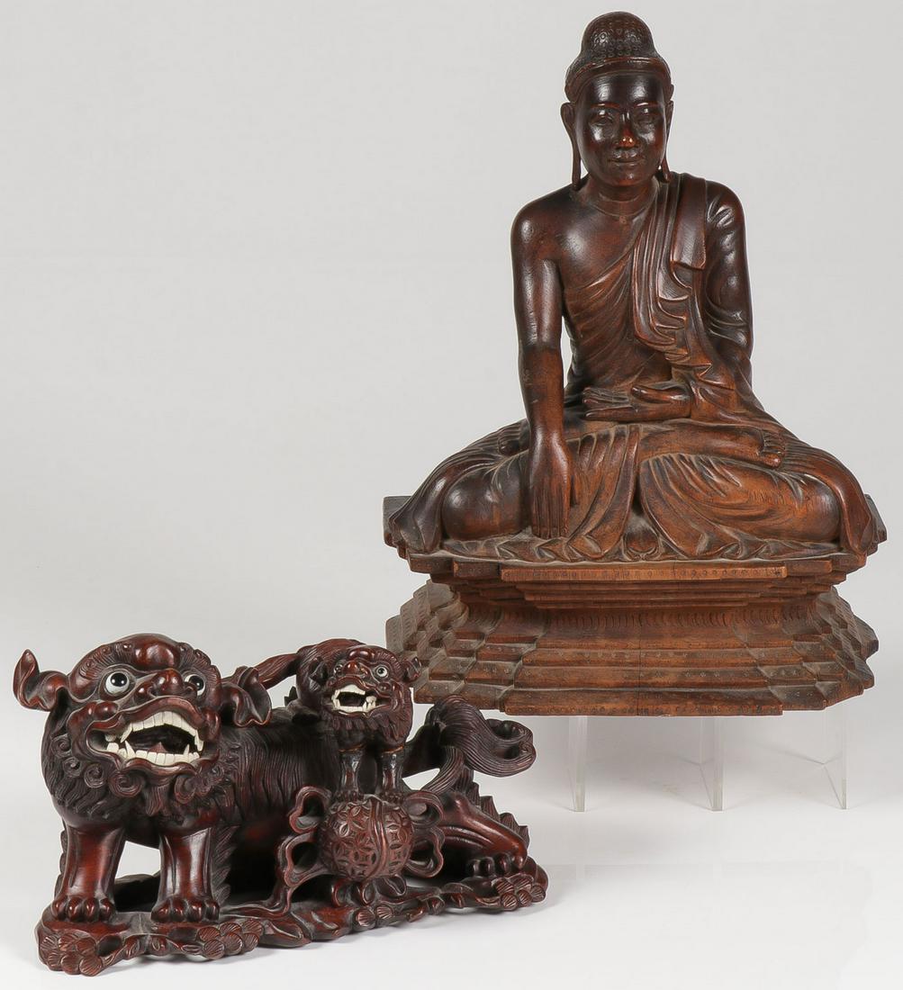 CHINESE CARVED WOOD SCULPTURES: CHINESE CARVED WOOD SCULPTURES. Comprising a carved seated buddha on integral base, height 16 inches, and a pair of finely carved foo dogs with bone teeth and porcelain eyes. SHIPPING NOTICE: Jacks