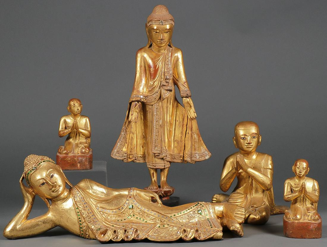 AN INTERESTING GROUP OF BUDDHA FIGURES: AN INTERESTING GROUP OF BUDDHA FIGURES. Comprising a Standing Buddha gilt wood and lacquer figure with inlaid mirror decoration. Height 23 inches. A Reclined gilt wood and lacquer Buddha with inlaid c