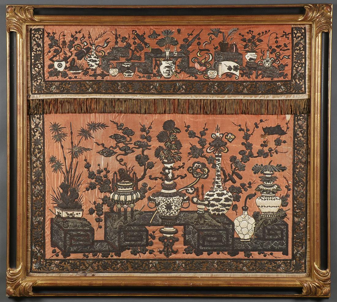 LARGE EMBROIDERED BUDDHIST IMAGERY PANEL: LARGE EMBROIDERED BUDDHIST IMAGERY PANEL. Comprising a large and impressive embroidered panel rendered in silver and dyed silk thread on a salmon silk ground in two parts, the upper panel depicting im