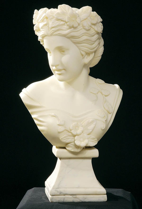 A CARVED MARBLE BUST OF A CLASSICAL BEAUTY 20th c