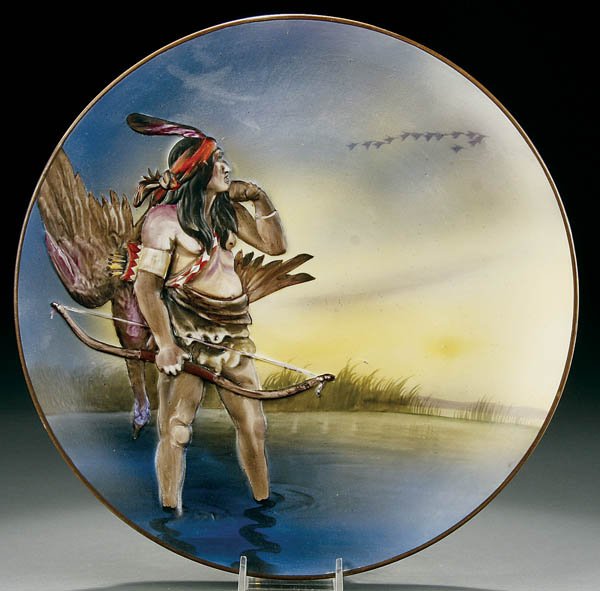 A NIPPON MOLDED INDIAN AND GOOSE PLAQUE