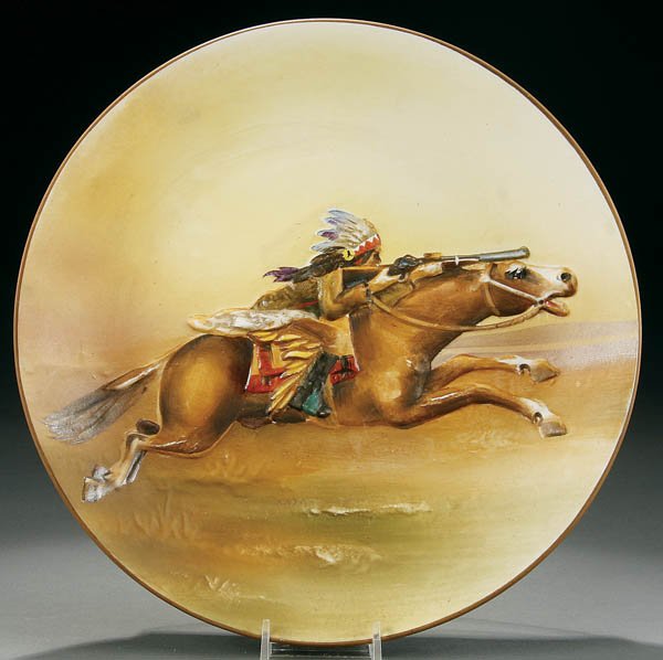 A NIPPON MOLDED INDIAN ON HORSEBACK PLAQUE