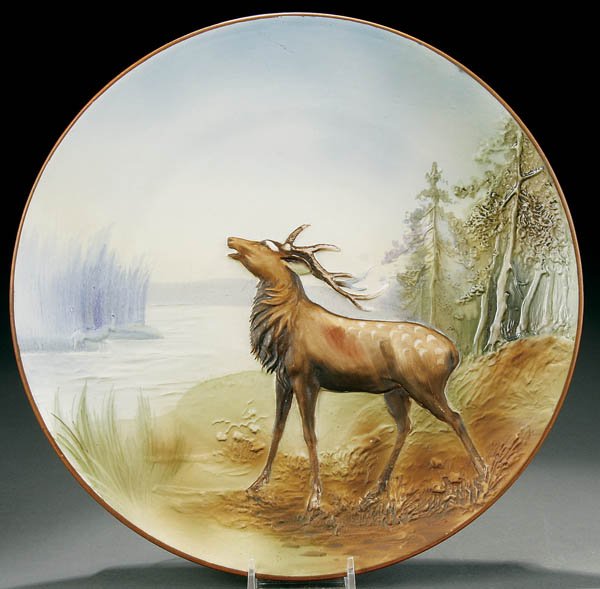 A HAND PAINTED NIPPON MOLDED BELLOWING ELK PLAQUE