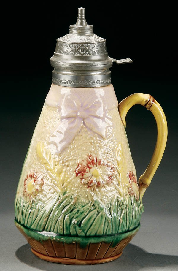 A MAJOLICA SYRUP PITCHER, late 19th century, coni