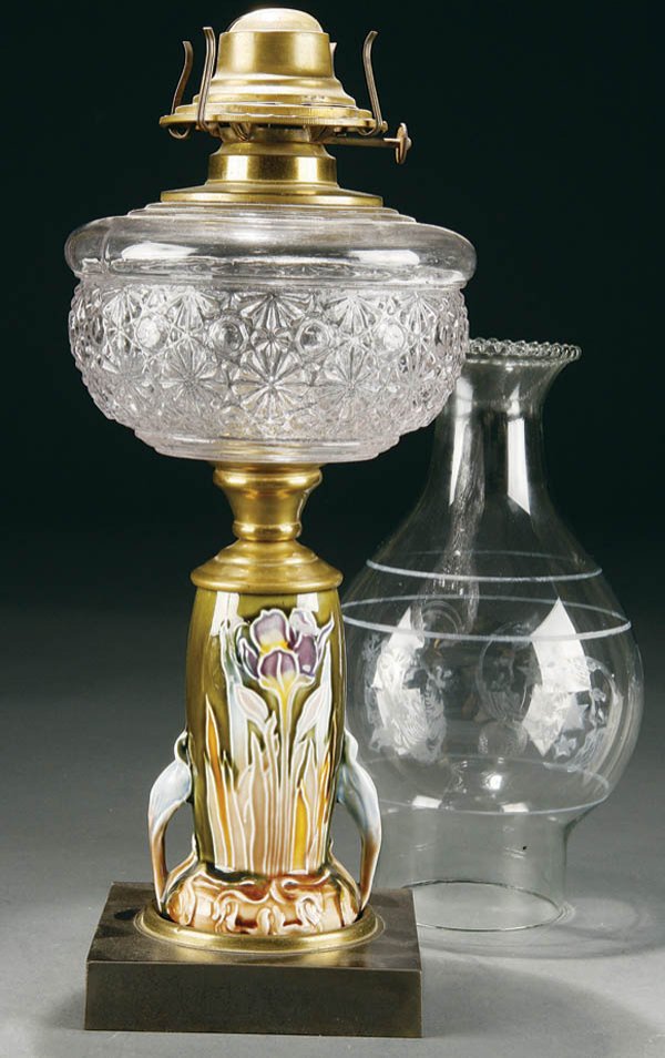 A GOOD MAJOLICA OIL LAMP, circa 1900, iris decora