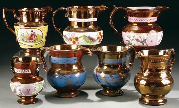 A 7 PIECE GROUPING OF COPPER LUSTRE PITCHERS, la