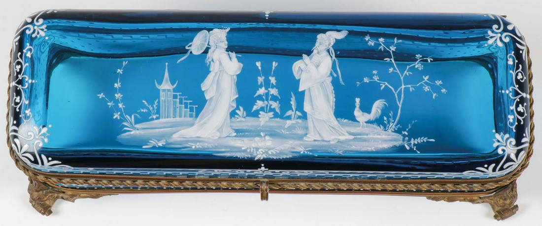 A MARY GREGORY GLOVE BOX, C. 1890: A MARY GREGORY GLOVE BOX, C. 1890. Comprising a large and impressive Bohemian (AKA Mary Gregory) enamel decorated sapphire blue glove box of rectangular form with rounded corners, the hinged lid maste