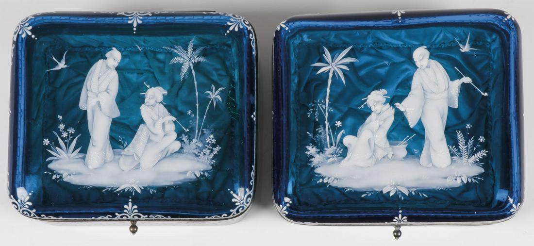 PAIR OF IMPORTANT MARY GREGORY BOXES, C. 1890: PAIR OF IMPORTANT MARY GREGORY BOXES, C. 1890. Comprising a pair of exceptionally decorated Bohemian (AKA Mary Gregory) enamel decorated sapphire blue glass boxes in the Oriental taste. The hinged lid