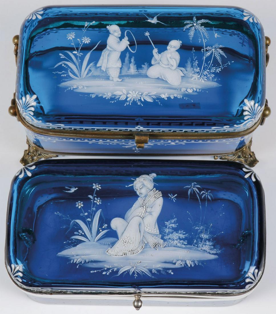 PAIR OF EXQUISITE MARY GREGORY BOXES, C. 1890: PAIR OF EXQUISITE MARY GREGORY BOXES, C. 1890. Comprising a pair of impressive Bohemian (AKA Mary Gregory) enamel decorated sapphire blue glass boxes in the oriental taste, both of rectangular form wi