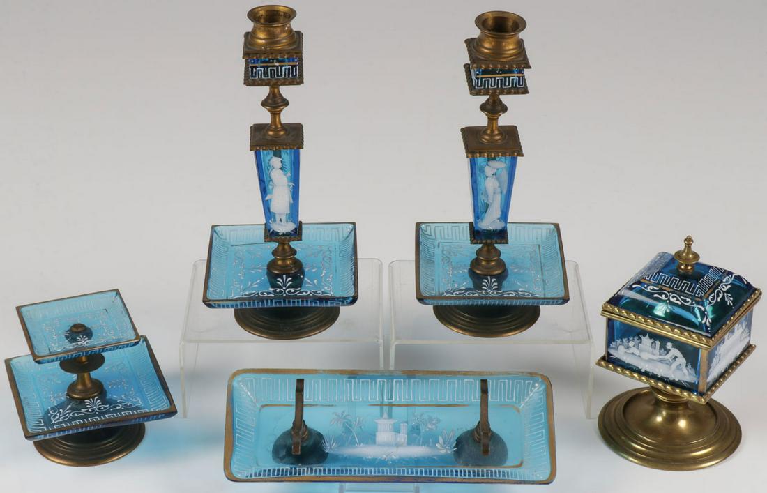 RARE MARY GREGORY DESK SET, C. 1900: RARE MARY GREGORY DESK SET, C. 1900. Comprising a five-piece Bohemian (AKA Mary Gregory) enamel decorated sapphire blue glass and ormolu mounted desk set in the Oriental taste including a pair of cand