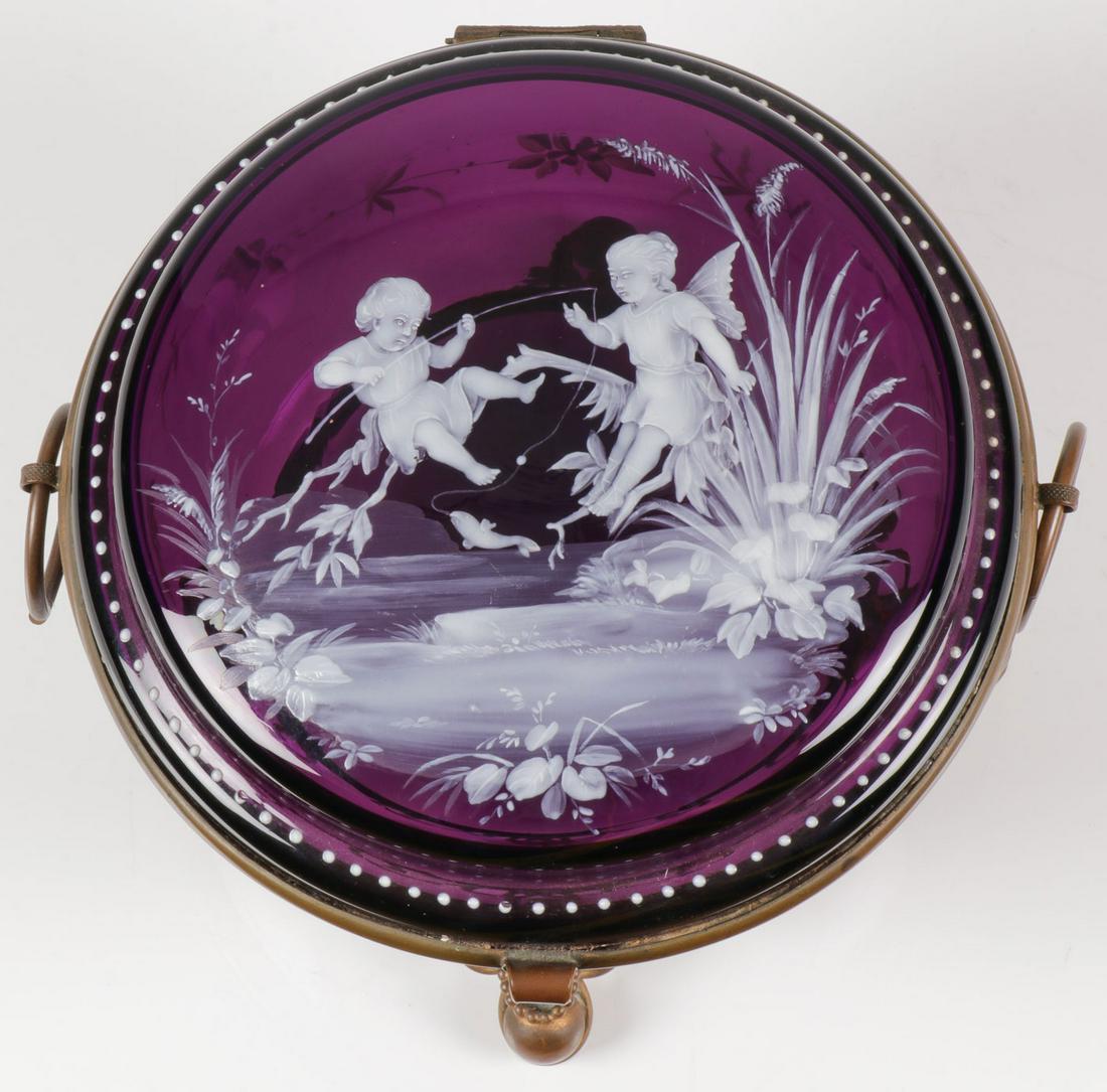 A LARGE MARY GREGORY GLASS BOX: A LARGE MARY GREGORY GLASS BOX. Comprising a large and impressive Bohemian (AKA Mary Gregory) enamel decorated amethyst glass box. The circular form set in wire frame, the hinged lid exceedingly well-