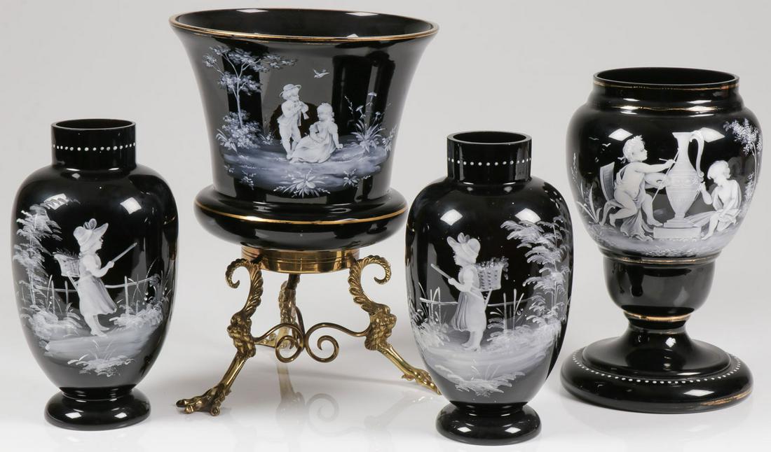 FOUR EXCEPTIONAL MARY GREGORY VASES, C. 1890: FOUR EXCEPTIONAL MARY GREGORY VASES, C. 1890. Comprising four individual pieces of exceptionally painted Bohemian (AKA Mary Gregory) enamel decorated black glass vases including a matching pair depict