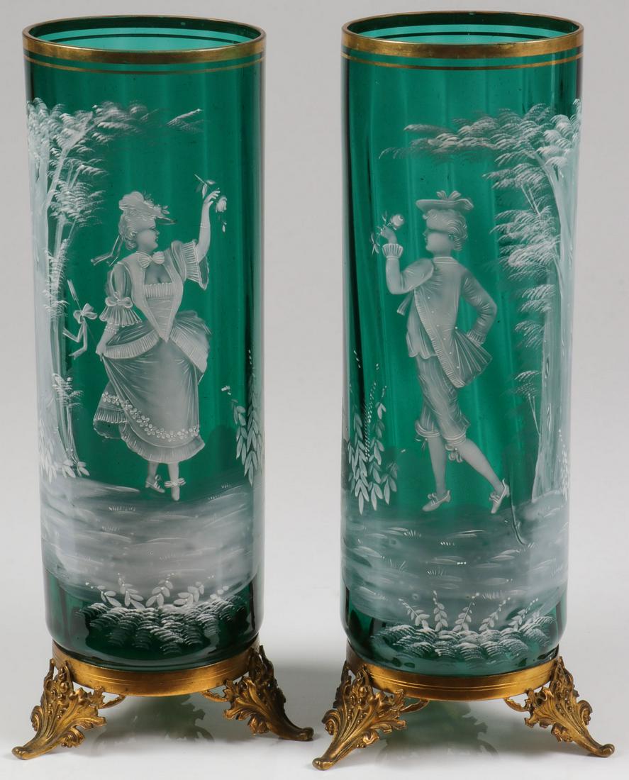 PAIR LARGE MARY GREGORY EMERALD MANTEL VASES: PAIR LARGE MARY GREGORY EMERALD MANTEL VASES. Comprising a large and impressive matching pair of Bohemian (AKA Mary Gregory) enamel decorated emerald green cylindrical vases with paneled sides, depict