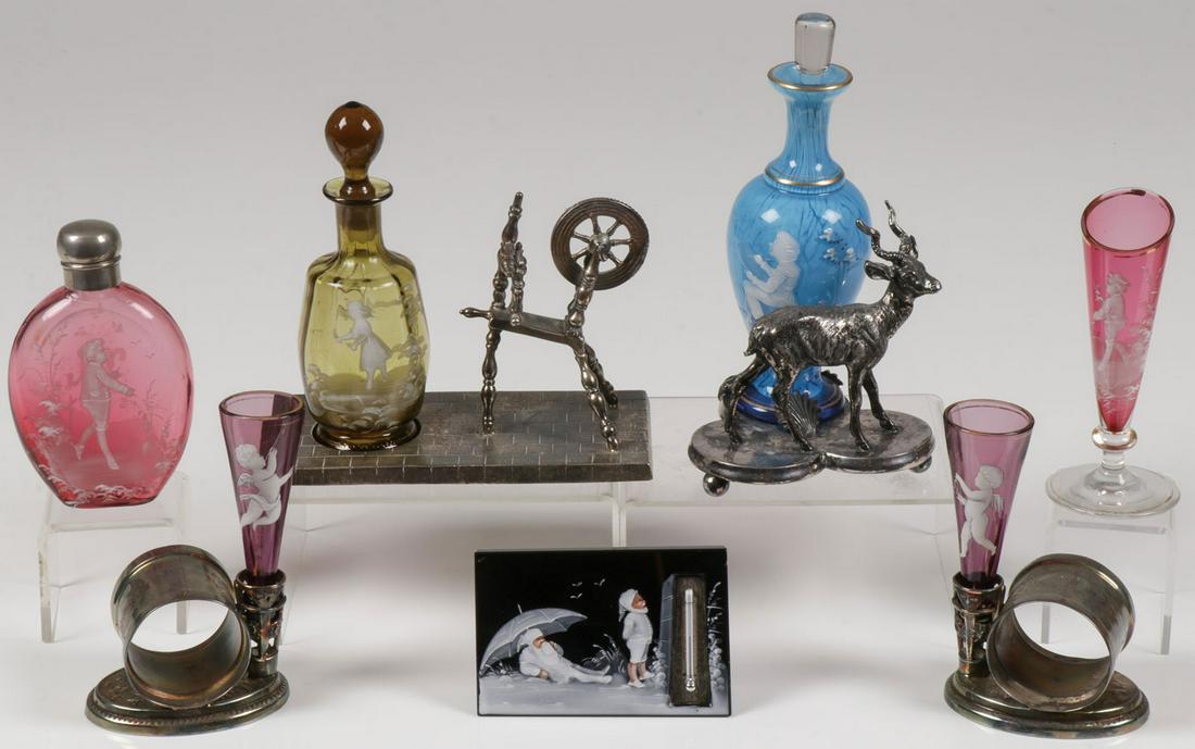 7 EXCEPTIONAL MARY GREGORY SMALLS, C. 1890: 7 EXCEPTIONAL MARY GREGORY SMALLS, C. 1890. Comprising seven individual pieces of Bohemian (AKA Mary Gregory) enamel decorated glassware. Including a charming amber perfume set on a spinning wheel wit