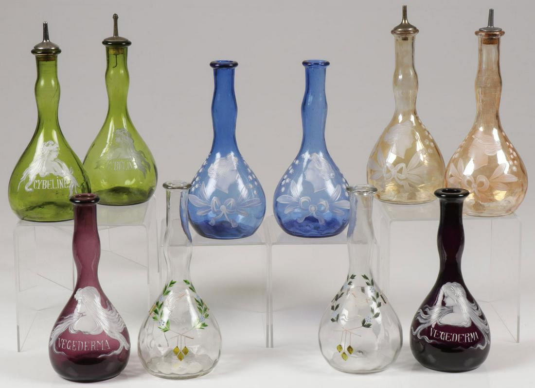 5 MARY GREGORY MATCHING BARBER BOTTLE SETS C 1900: FIVE MARY GREGORY MATCHING BARBER BOTTLE SETS, CIRCA 1900. Comprising 10 individual bottles making up 5 matching sets of Bohemian (AKA Mary Gregory) enamel decorated glass barber bottles of various co