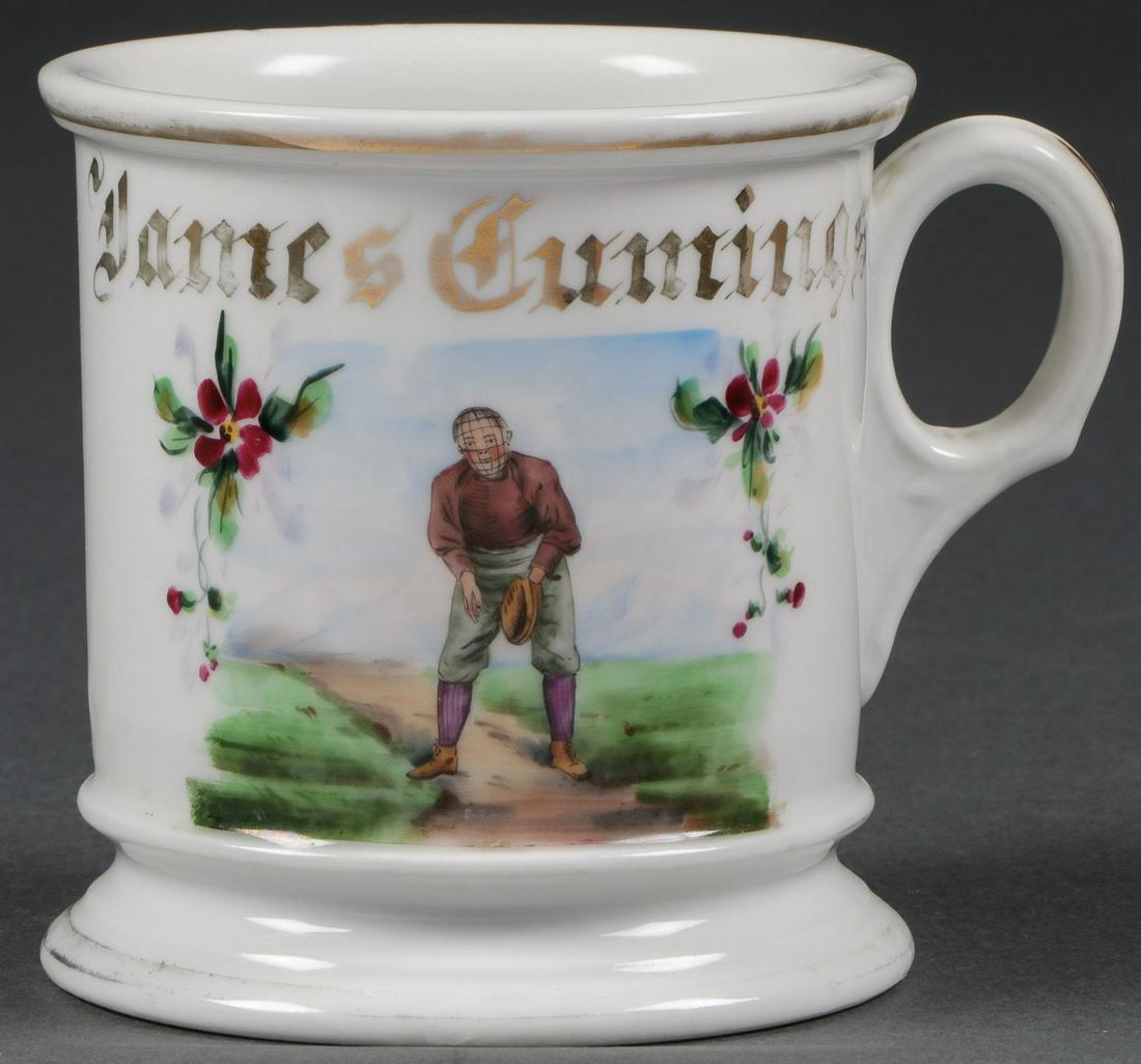 RARE BASEBALL OCCUPTIONAL SHAVING MUG, C. 1890: RARE BASEBALL OCCUPTIONAL SHAVING MUG, C. 1890. Named to a James Cumings depicting a baseball player (catcher) with face mask, and inscribed on bottom Weyer?. Height 3.75 inches.Provenance:Lifetime