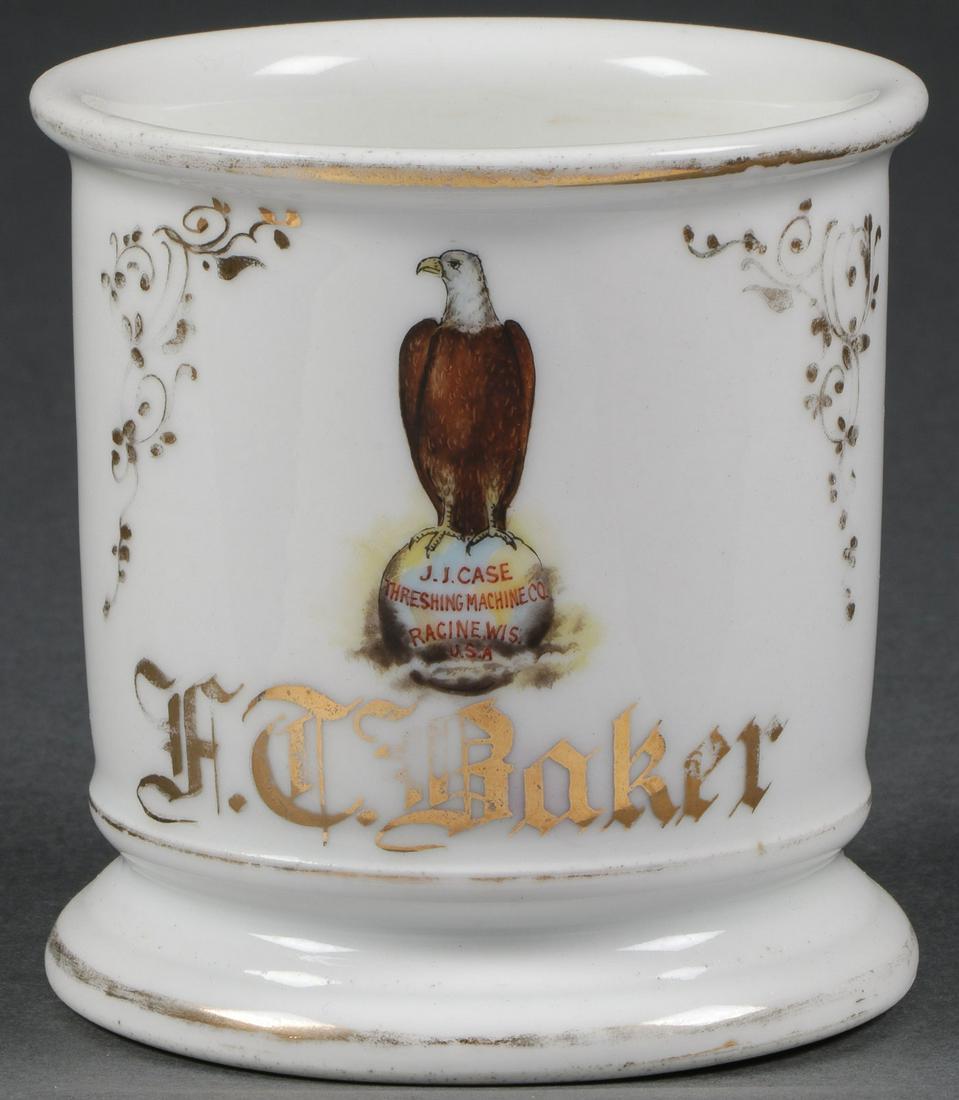 RARE J. I. CASE SHAVING MUG, C. 1890: A J. I. CASE SHAVING MUG, C. 1890. Named to an F.C. Baker beneath the Case bald eagle and globe logo. Height 4 inches.Provenance:Lifetime collection of Dr. Reid (1941-2014) and Nuray Palmer, Ames, I