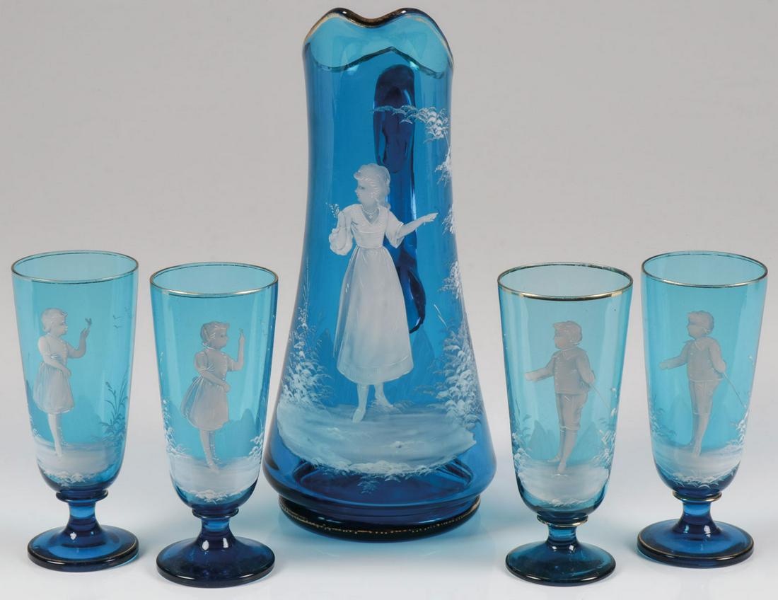 MARY GREGORY SAPPHIRE PITCHER & GOBLETS C. 1890: OLD MARY GREGORY SAPPHIRE BLUE PITCHER & GOBLETS. Comprising a lovely Bohemian (AKA Mary Gregory) sapphire blue and white enamel pitcher with four footed goblets, each finely enameled with figures and